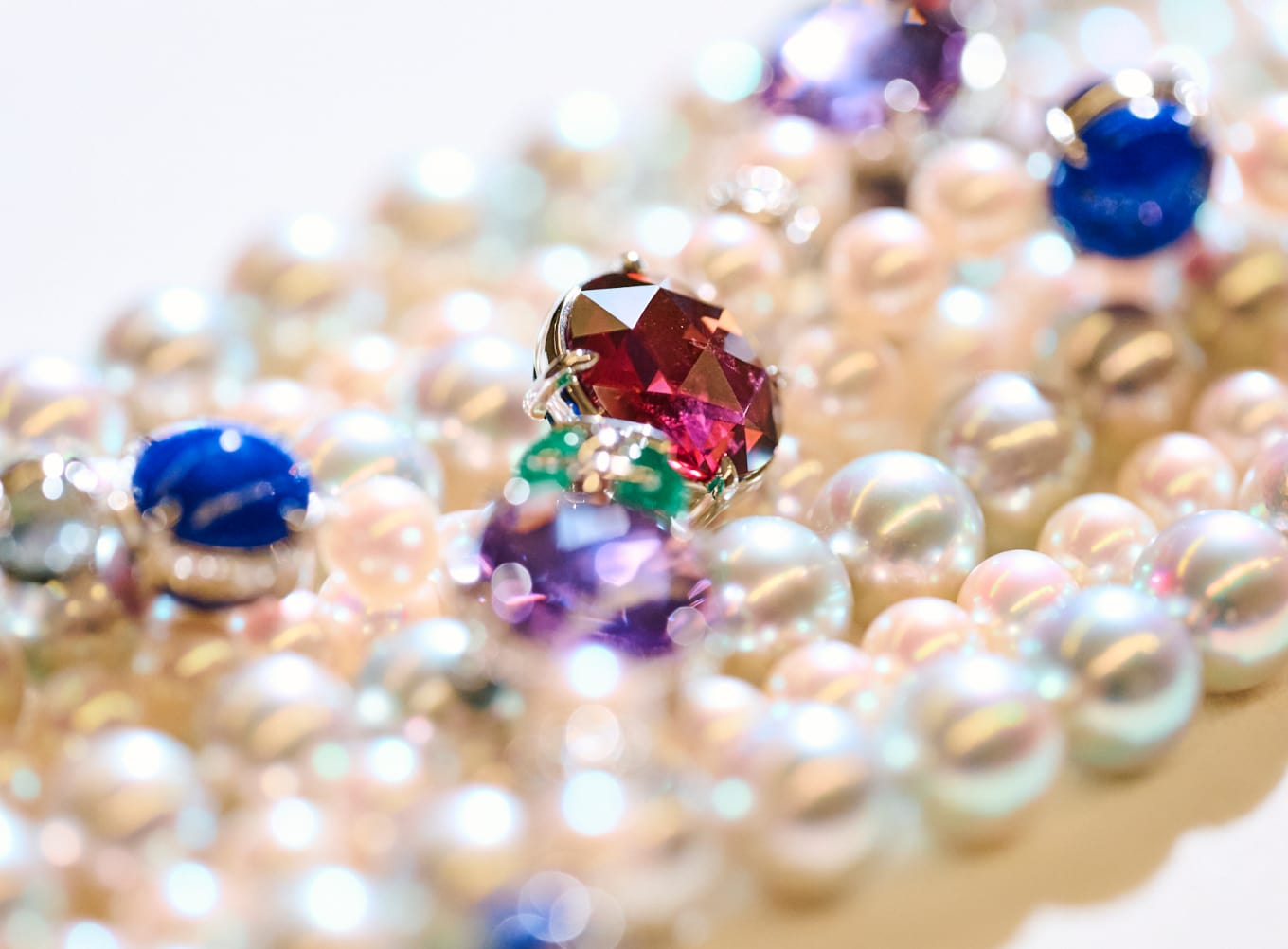 THE WORLD OF COLOURED <br>GEMSTONES
